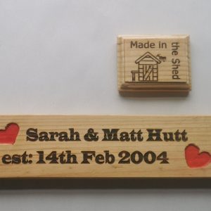Marrige sign with the bride and Grooms names on it and also there wedding date.