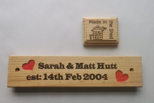Marrige sign with the bride and Grooms names on it and also there wedding date.